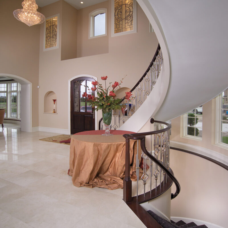 Contemporary Curved Staircase with Stainless Steel Balusters