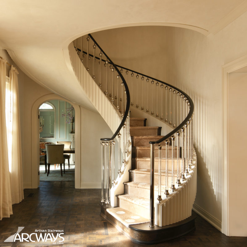 Contemporary Curved Staircase in Wood with Nickel-Plated Acrylic Balusters | Austin, Texas