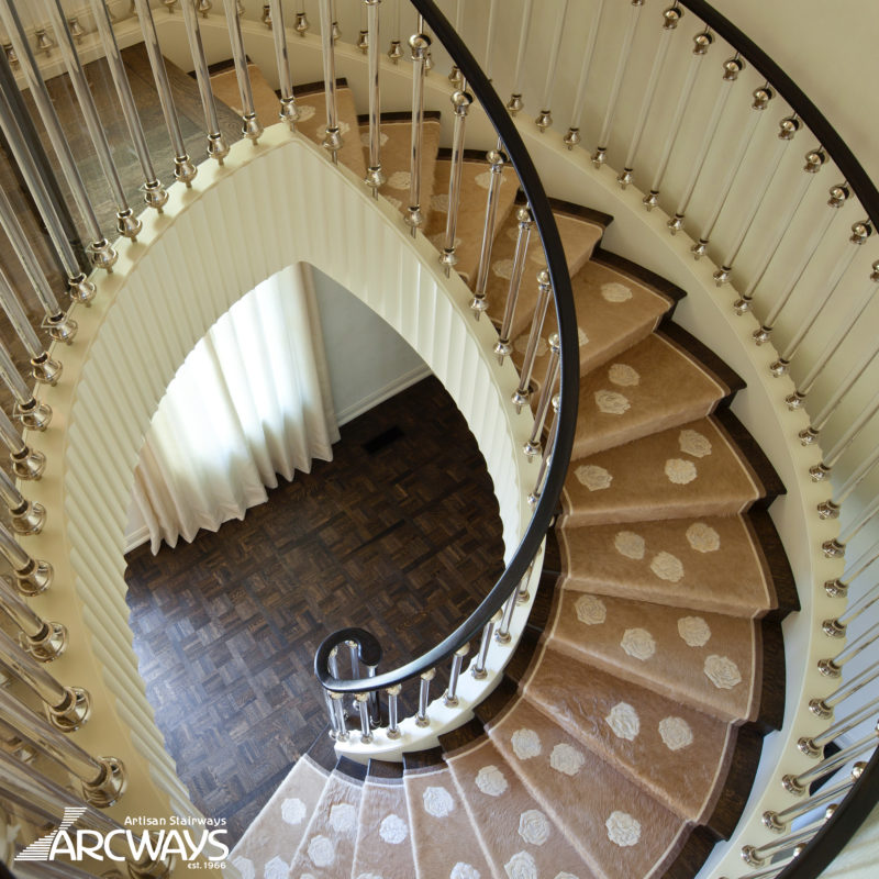 Contemporary Curved Staircase in Wood with Nickel-Plated Acrylic Balusters | Austin, Texas