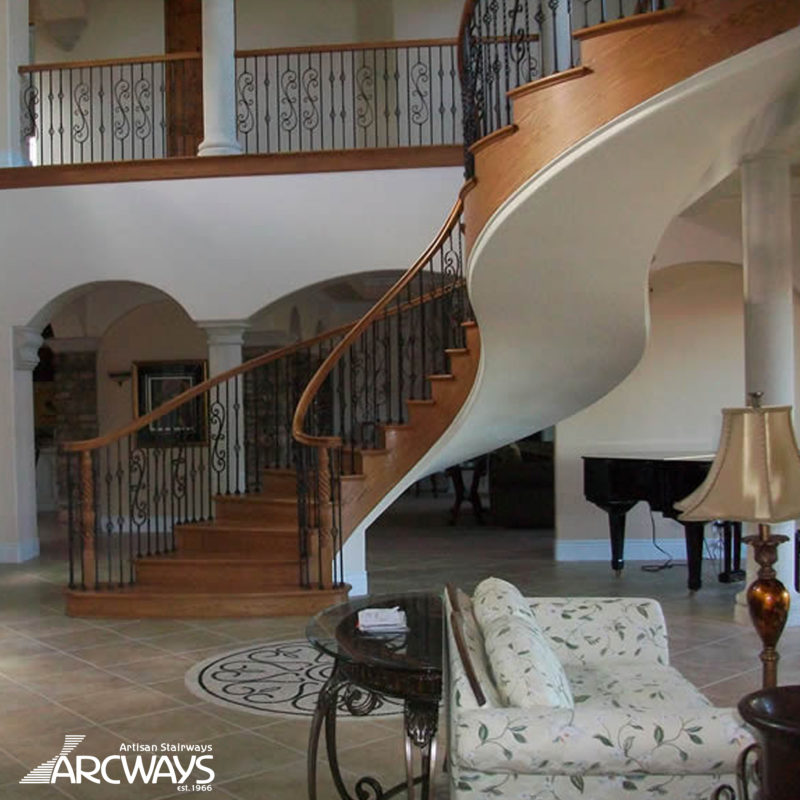 Classical Floating S-Shaped Curved Staircase with Iron Balustrade | Beverly Hills, California
