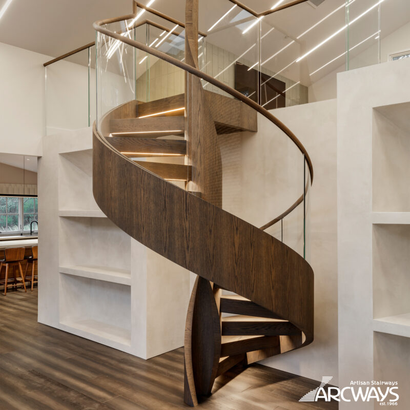 Floating Helical Stair Design with Glass Balustrade and Integrated Lighting in California