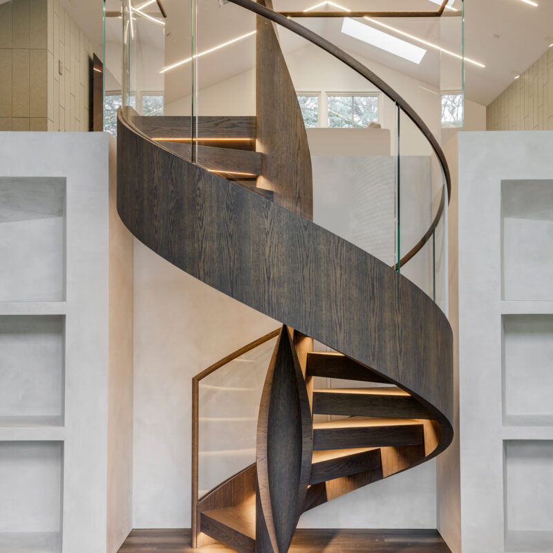 Modern Floating Helical Staircase Design with Glass Balustrade and Integrated Lighting | California