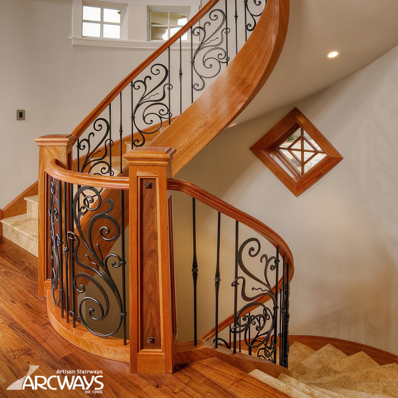 Curved Staircase Design With Stone And Iron Panels
