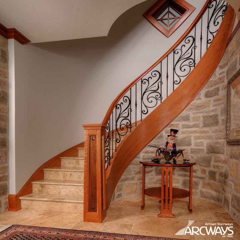 Curved Staircase Design With Stone And Iron Panels