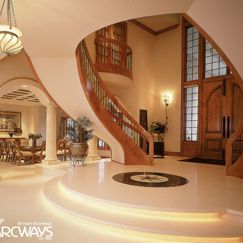 Symmetrical Floating Curved Staircases with Custom Iron Balusters