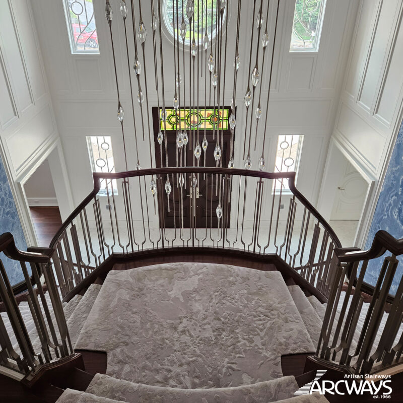 Grand Symmetrical Curved Staircase with Stainless Steel Balustrade