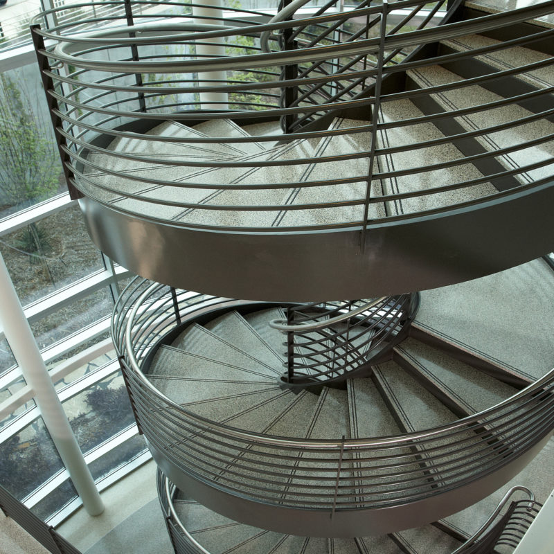 Arcways Commercial Freestanding Circular Spiral Stairs in Metal and Stone