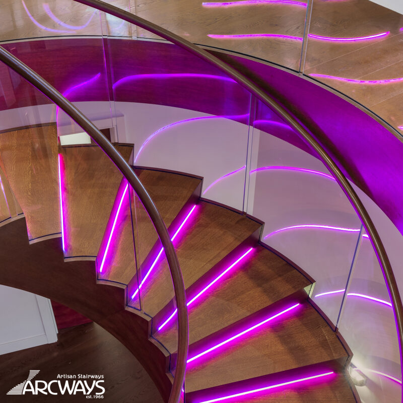 Modern Curved Floating Staircase Design With Glass Balustrade and Integrated Lighting | Seattle, Washington
