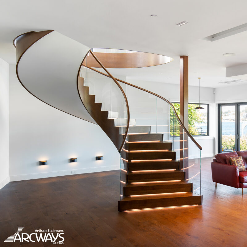 Modern Curved Floating Staircase Design With Glass Balustrade and Integrated Lighting | Seattle, Washington